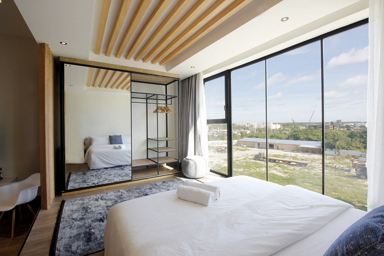 Studio, área de coworking, gym, padel y restaurant