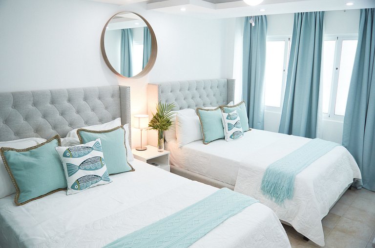 Sleeps 6, steps from the beach and with a pool