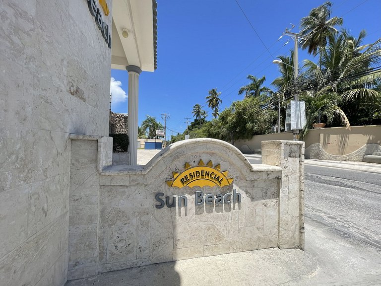 Apartamento con Estilo y Piscina, cerca de Playa