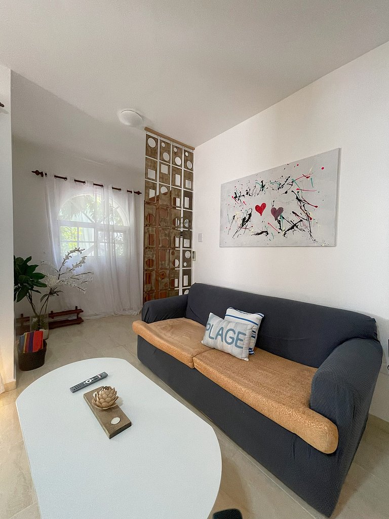 Apartamento con Estilo y Piscina, cerca de Playa