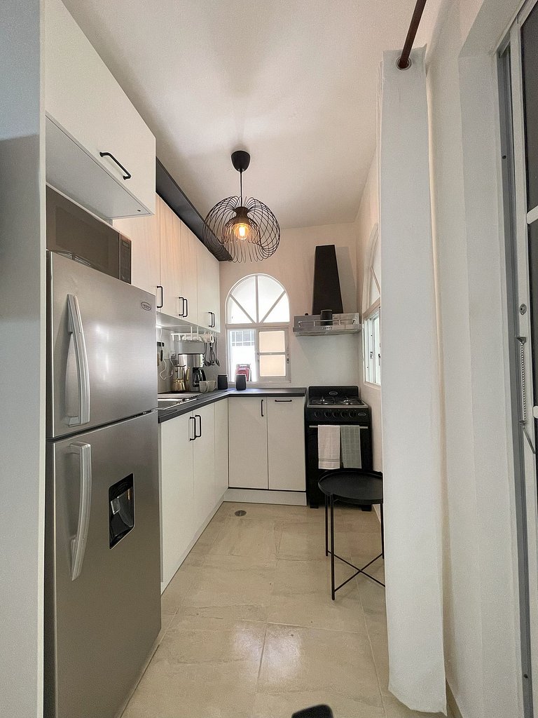 Apartamento con Estilo y Piscina, cerca de Playa