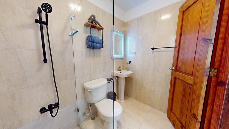 Stylish Apartment with Pool, Steps from the Beach
