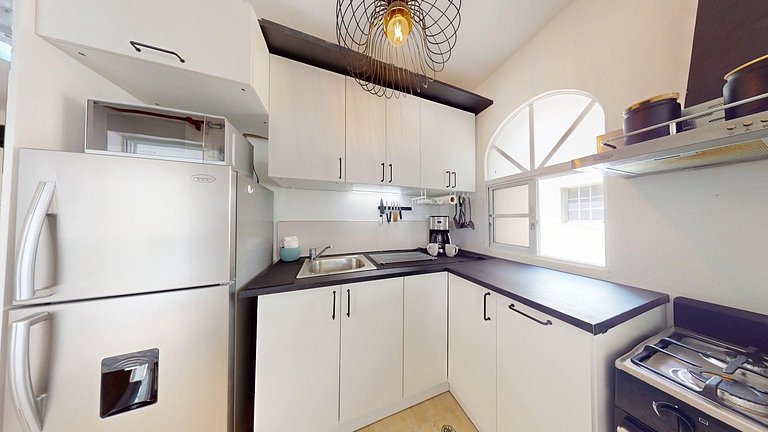 Stylish Apartment with Pool, Steps from the Beach