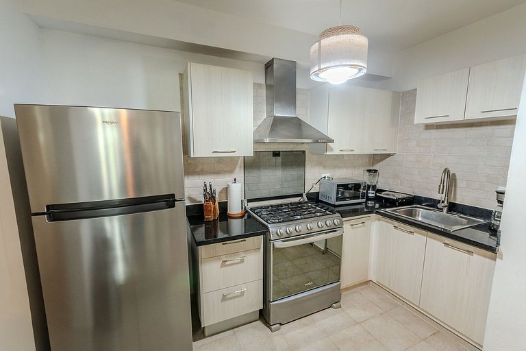 Two minute walk to the beach with a swimming pool