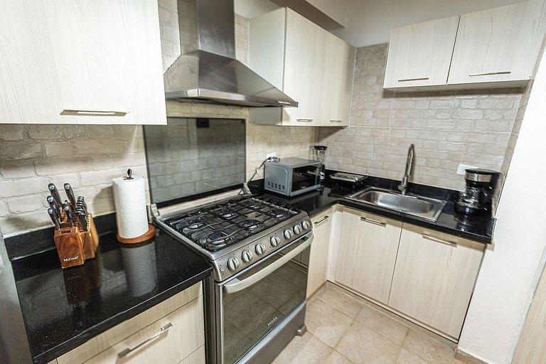 Two minute walk to the beach with a swimming pool