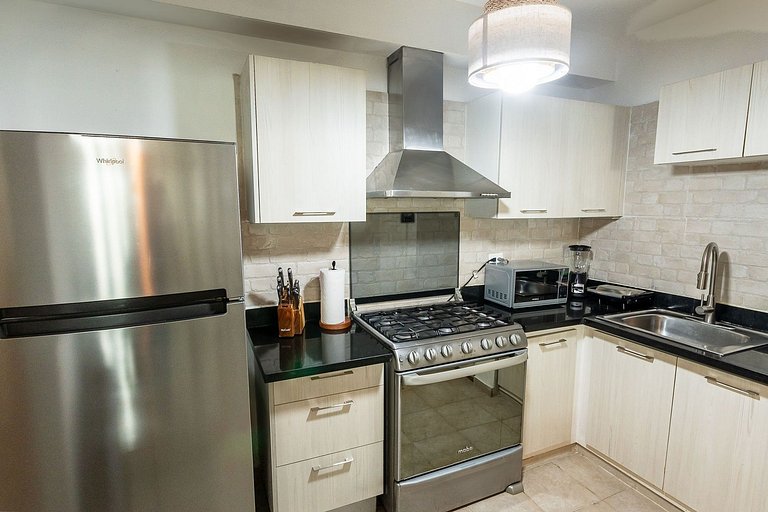 Two minute walk to the beach with a swimming pool